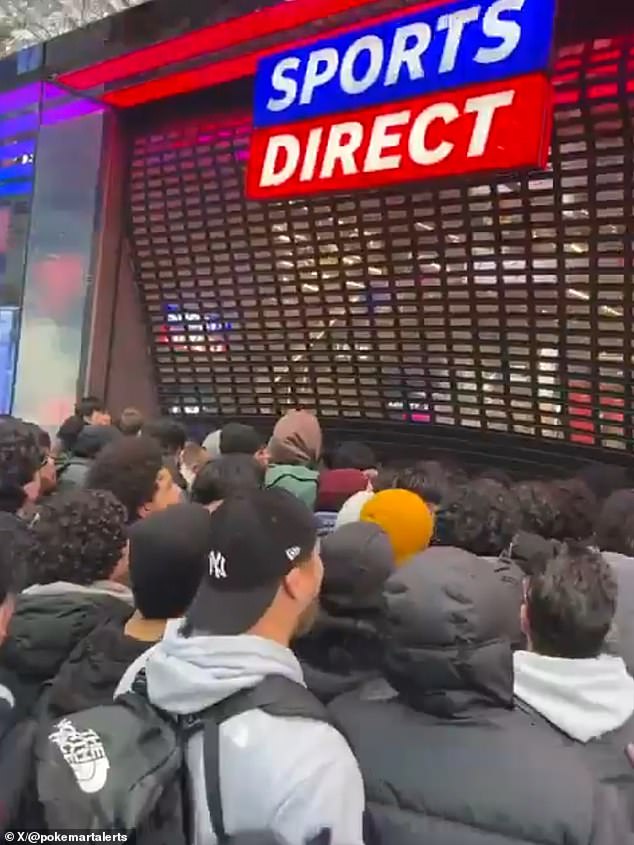 Moment crazed Pokemon fans force Sports Direct shutters open as they rush inside for new trading cards that can be worth thousands