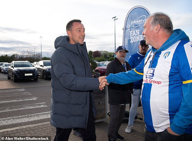 Chelsea legend John Terry pitches up at Colchester United game amid ‘£14m takeover’ – as one of his family members starts the match!