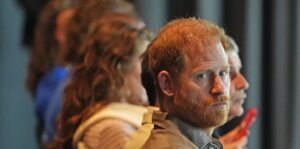 Prince Harry opens up about the ‘real struggles’ of fatherhood as he reveals he went to therapy as a new dad during emotional talk at AFL club – while Meghan is nowhere to be seen