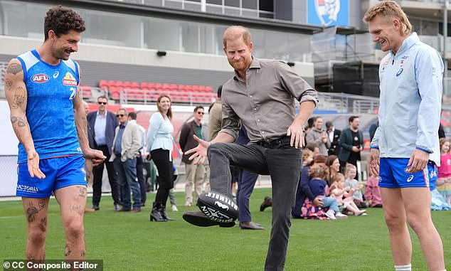 Prince Harry leaves footy fans bitterly disappointed as he visits AFL team – and gets heartwarming presents for Archie and Lilibet