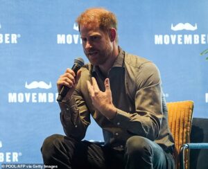Prince Harry tells of struggle when son Archie was born at talk on men’s mental health panel during Australian quasi-Royal tour – but Meghan is nowhere to be seen