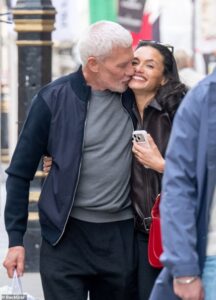Wayne Lineker, 63, packs on the PDA with mystery brunette after saying finding love was ‘the last piece in my puzzle’ following eight months of sobriety and healing 17-year rift with brother Gary