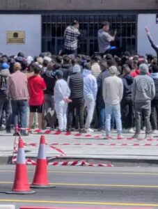 Thousands of migrants descend on consulates across Spain after socialist government gave the green light to give 500,000 legal status