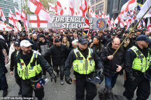 Police make first arrests as far right Britain First followers and counter-protesters face off in Manchester city centre demo