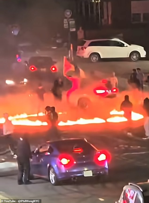 Chaos as 100 cars descend on sleepy New York neighborhood turning it into fiery Mad Max-style hellscape