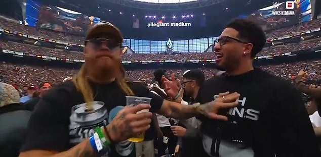 Moment George Kittle STEALS Tyrese Haliburton’s beer and chugs it in front of him as NFL and NBA stars cross paths at WrestleMania