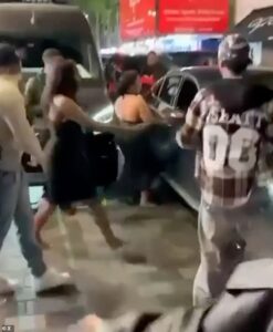 Moment car ploughs into crowd of pedestrians on busy London street as woman, 29, is arrested – with woman in her 30s fighting for her life in hospital