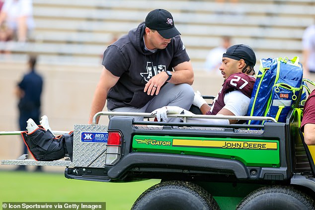 Disaster for college football team as captain gets carted off in game four months before season starts