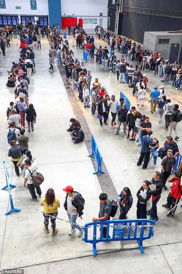 Spain throws open its doors to undocumented migrants: Huge queues continue to form after socialist government granted citizenship to 500,000 people