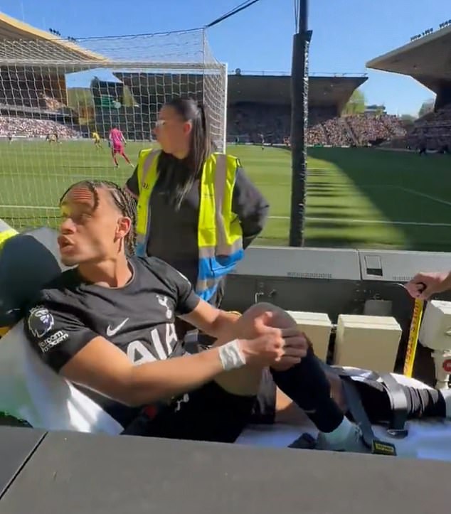 Xavi Simons shouts ‘F*** YOU’ after abuse from Wolves fans as injured star is wheeled away – with relegation battle tensions boiling over