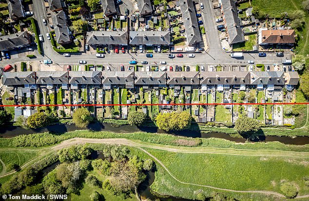 Homeowners told to pay up to £14,000 to local council after illegally trespassing on land they thought were their back gardens