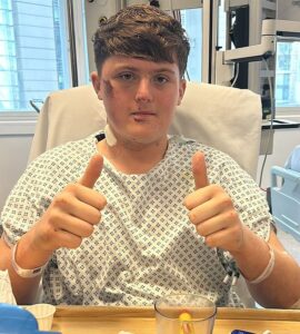 Teen whose heart stopped for 13 minutes after he fell on to Tube tracks completes London Marathon less than 18 months after cheating death