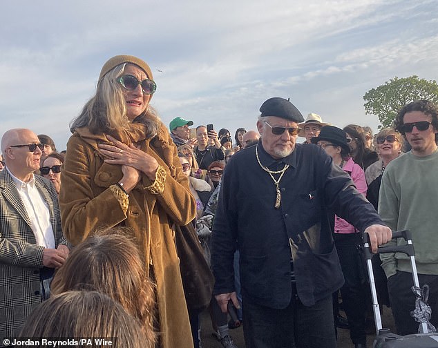 Madness frontman Suggs sings at emotional vigil for Finbar Sullivan, 21, who was stabbed to death at Primrose Hill