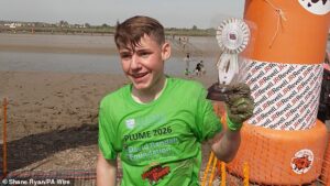 Paralympics hero’s son, 16, fights off hundreds of plucky racers wading across boggy riverbed to win annual Maldon Mud Race