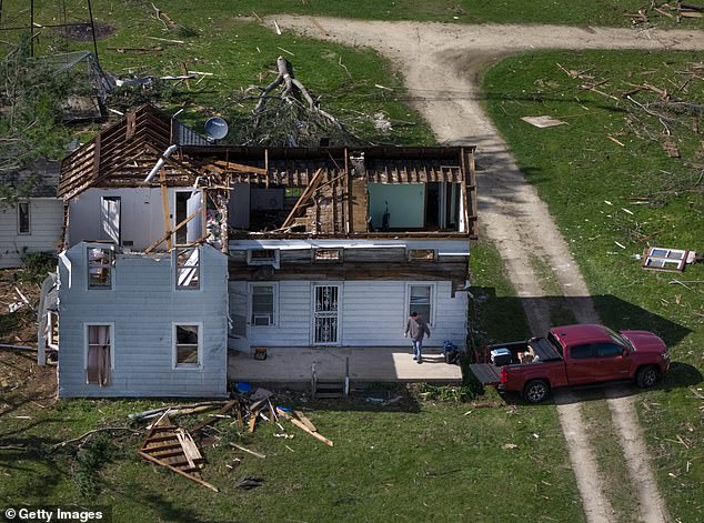 Tornado terror grips heartland: 50 million in path of violent storm outbreak across US after baseball-sized hail and twisters leave homes shattered