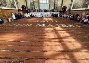 World’s longest ever tiramisu is made in London: Chefs use 3000 eggs and 50,000 ladyfinger biscuits to break record with 1,445ft dessert – exceeding the height of the Shard