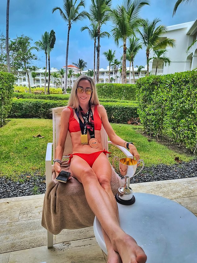 Top British runner whose ‘foot exploded’ looks in high spirits as she finally posts medal picture two days after ripping open toe during London Marathon