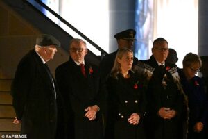 Disgraceful moment Aboriginal leaders are BOOED at packed dawn services as alleged heckler is arrested – while Ben Roberts-Smith shares defiant message and is swarmed by supporters