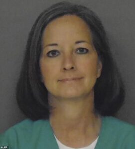 Evil mother who drowned her two young children in car then had sex with prison guards is up for parole AGAIN