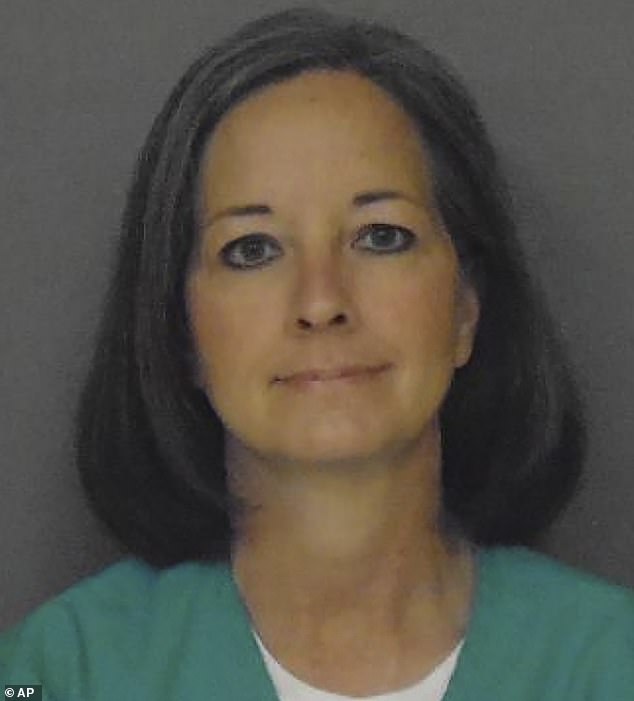 Evil mother who drowned her two young children in car then had sex with prison guards is up for parole AGAIN