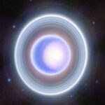 Mysterious rings around Uranus point to hidden moons orbiting the ice giant