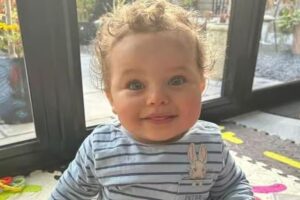 Teacher ‘who abused and murdered baby he was adopting’ told police of ‘panicked’ struggle to revive him ‘after child accidentally fell off chair into bath’, court hears