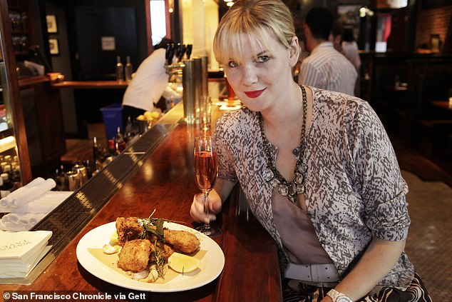 Glamorous owner of legendary restaurant ordered to pay $1million after feud with ex-partner as eatery faces closing for good