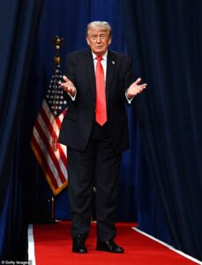 Trump gives brutal impression of congresswoman Ilhan Omar summoning brother she is accused of marrying into bed