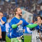Ex-Liverpool flop celebrates promotion from second-tier as glamorous wife reveals he came close to QUITTING the game after Champions League nightmare