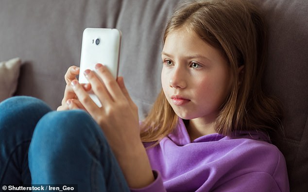 Kids aged 10 more likely to own a phone than know how to throw a ball amid rise of ‘iPad kids’
