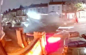 Moment police chase ends in carnage as driver smashes into parked cars on quiet residential road