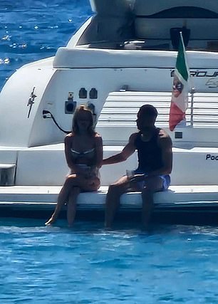 Real Madrid fans turn on Kylian Mbappe with 250,000 signing a petition calling for him to go – as images emerge of him cosying up to new girlfriend on a yacht while team-mates surrender title to Barcelona