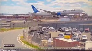 Harrowing moment United flight hits light pole and truck while landing at Newark Airport