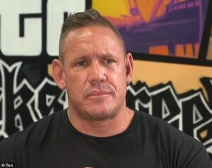 Brisbane business owner is charged over disturbing videos