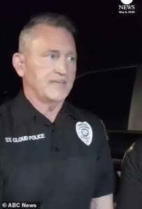 Incredible moment father and son team save six people battling chopping waves after boat sank on Florida lake