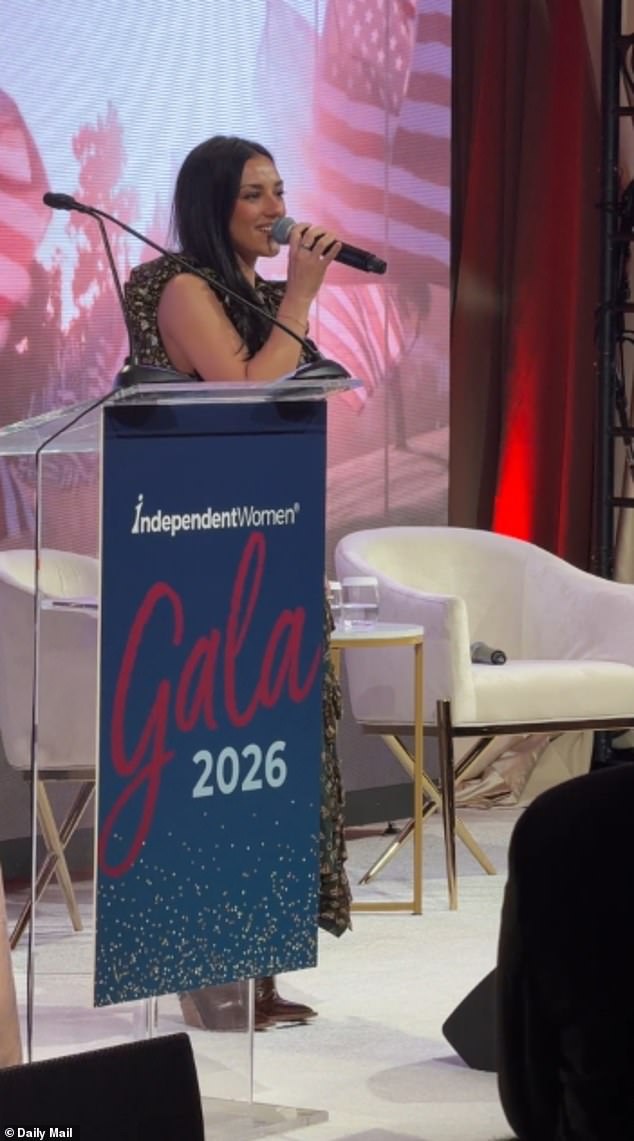 Kash Patel’s girlfriend belts out the national anthem for adoring boyfriend and Trump allies