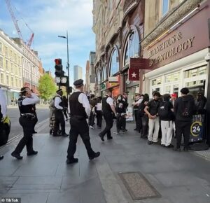 TikTokers mob Scientology buildings as viral ‘speed run’ stunt comes to UK: Moment youths descend on church’s London HQ in bid to sprint inside