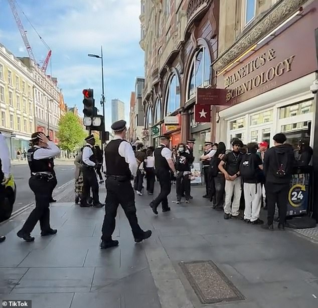 TikTokers mob Scientology buildings as viral ‘speed run’ stunt comes to UK: Moment youths descend on church’s London HQ in bid to sprint inside