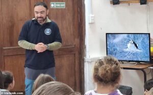 Passenger and two crew members from hantavirus cruise ship visited a school during stop at ‘world’s most remote island’ where Brit has suspected infection