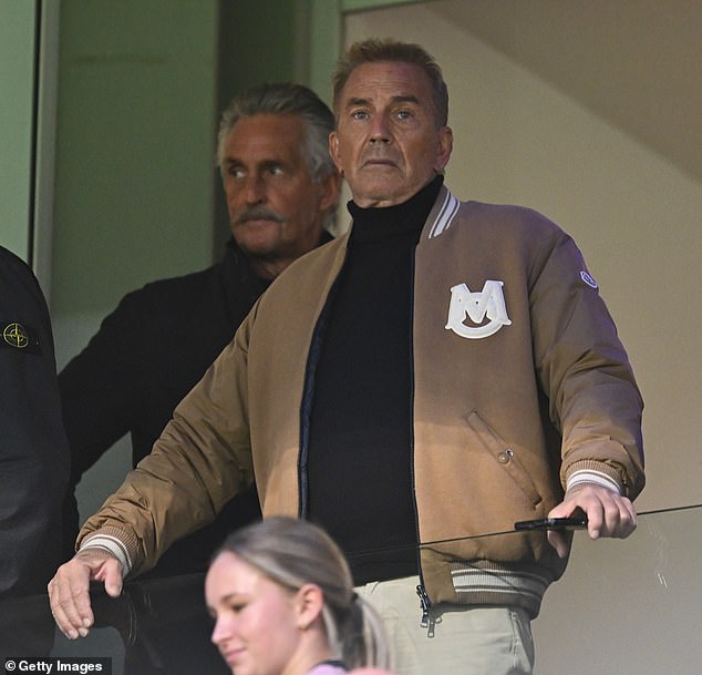 Hollywood legend spotted in the crowd at AFL match as he takes a break from filming with Jake Gyllenhaal Down Under