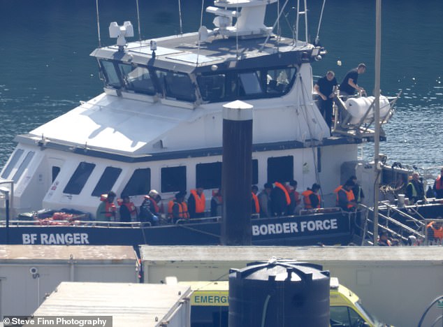 SUE REID: The moment Britain’s 200,000th Channel migrant landed in Dover after being ‘plucked from rubber boat’