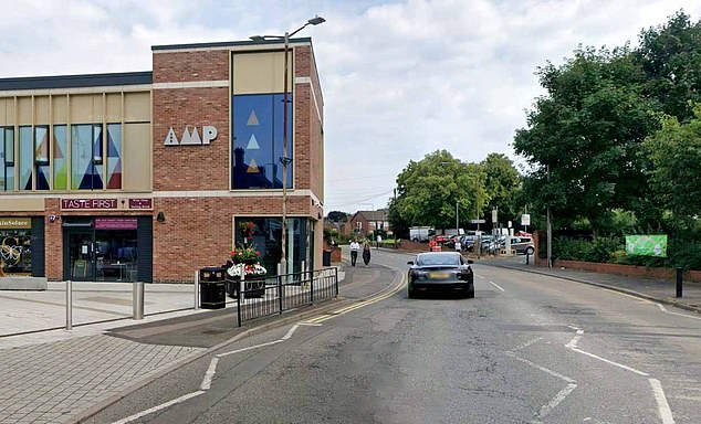 Car ploughs into pedestrians on busy street with several rushed to hospital including one fighting for life as police launch hunt for driver
