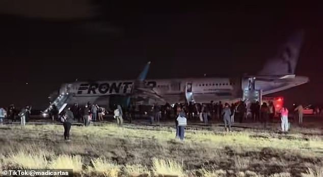 Horror as Frontier Airlines flight with 231 people onboard kills a pedestrian on runway during takeoff sparking slide evacuation