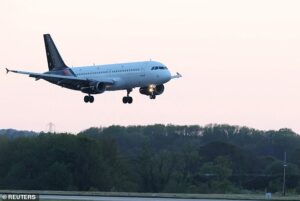 Plane carrying Brits from rat virus ship touches down in Manchester