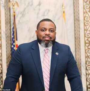 Governor’s aide who faces drug trafficking charges said he should be allowed to keep $31k payout in the interests of DEI