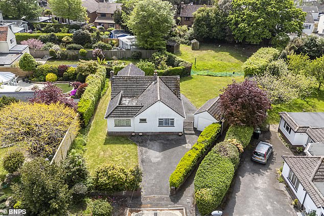 Horrified neighbours say they’ll be left looking at a ‘prison wall’ when developers go ahead with plan to bulldoze bungalow and throw up two-storey houses instead
