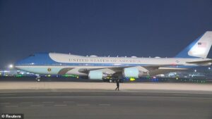 Trump smiles and fist pumps as he’s greeted by 300 chanting Chinese kids waving American flags as he prepares to meet Xi amid Iran tensions