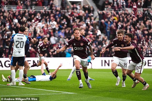 Scottish Premiership title race goes to the FINAL day! Hearts fume at ‘disgusting’ Celtic penalty decision as controversial victory for Martin O’Neill’s side means just ONE point separates rivals ahead of showdown at Parkhead