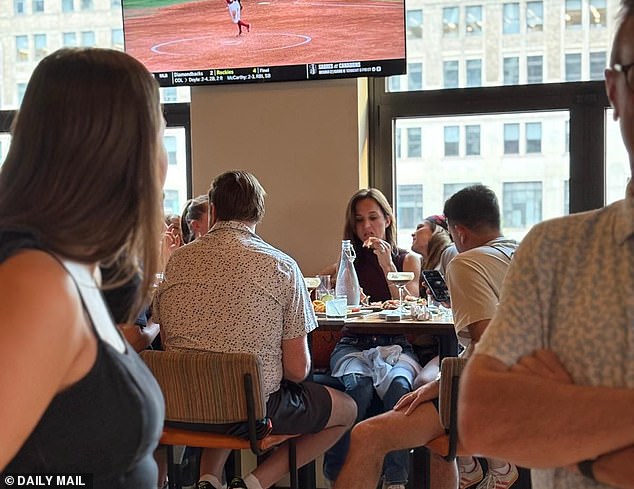 Dianna Russini tries to brush off Mike Vrabel affair scandal as she’s spotted partying with her husband and pals before Bruce Springsteen concert