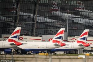 British Airways passengers forced to wait on tarmac for THREE HOURS after ‘brainless’ staff activate emergency slide
